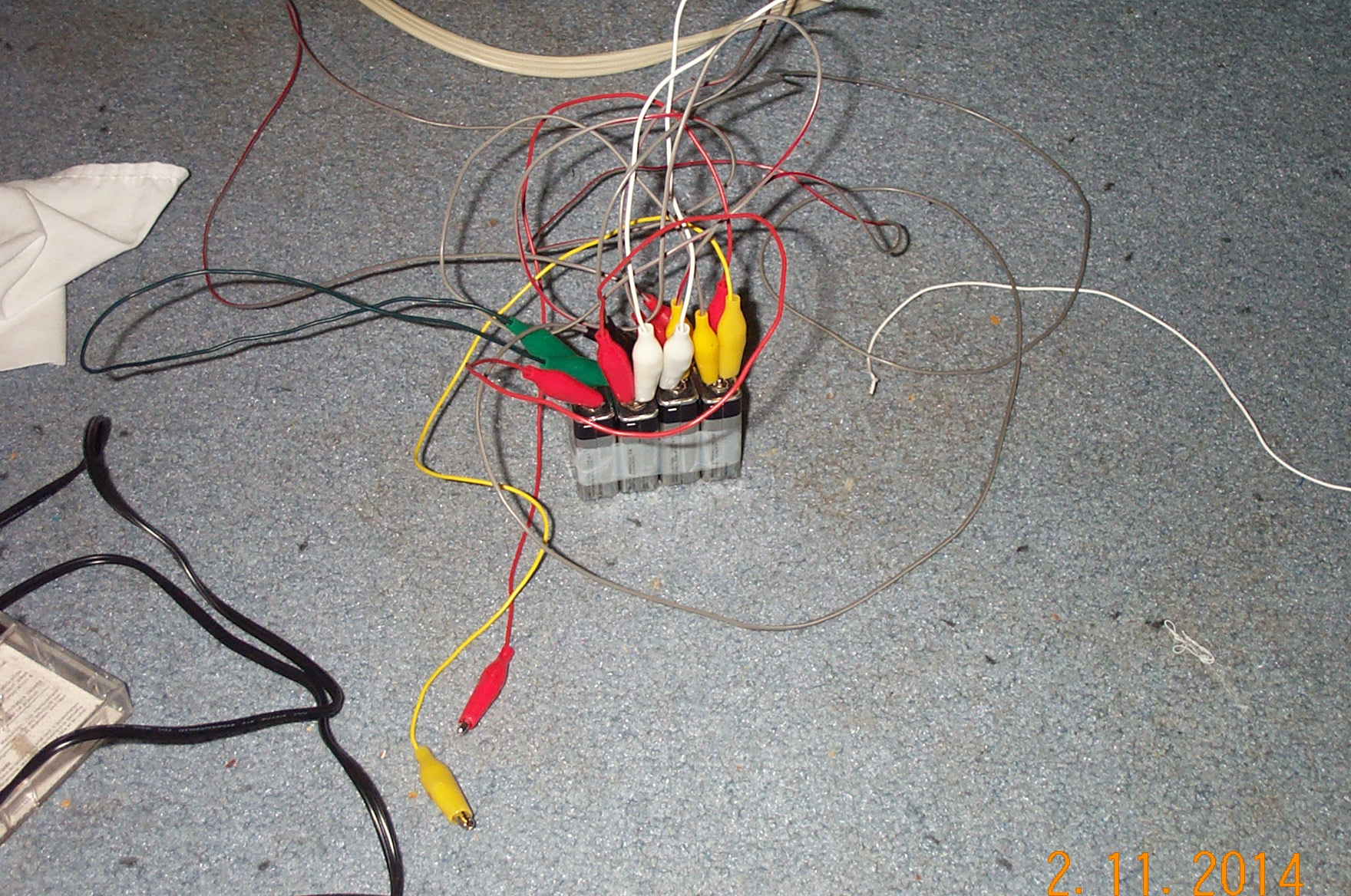 Battery bank, taped together with the wires strapped in bundles Battery bank, taped together with the wires strapped in bundles